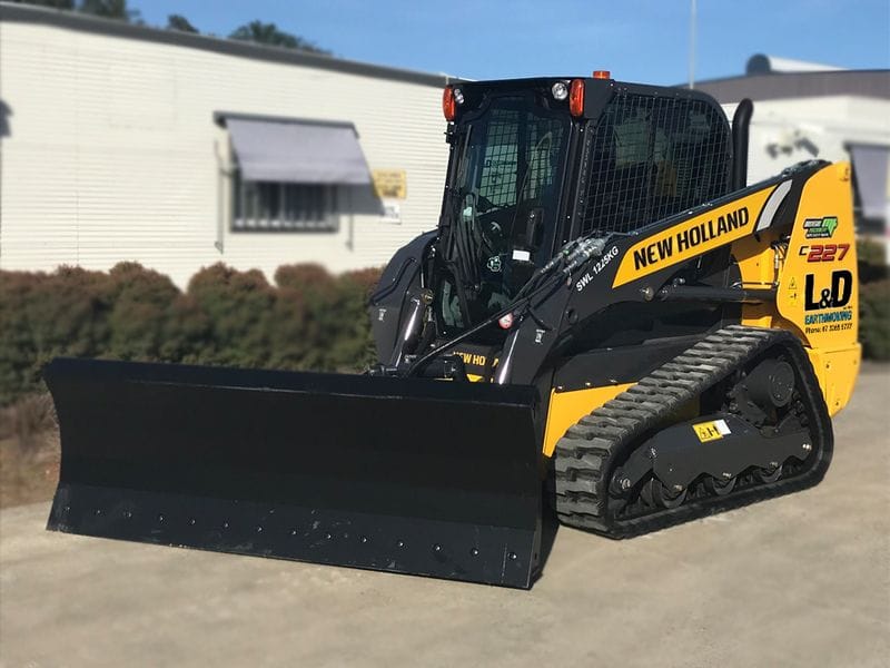 New Holland Skid Steer Loader with optional Dozer Blade New Holland Skid Steer Loader with optional Dozer Blade